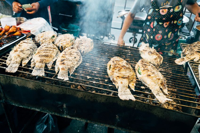 fish cooking on a grill - not a picture from the class